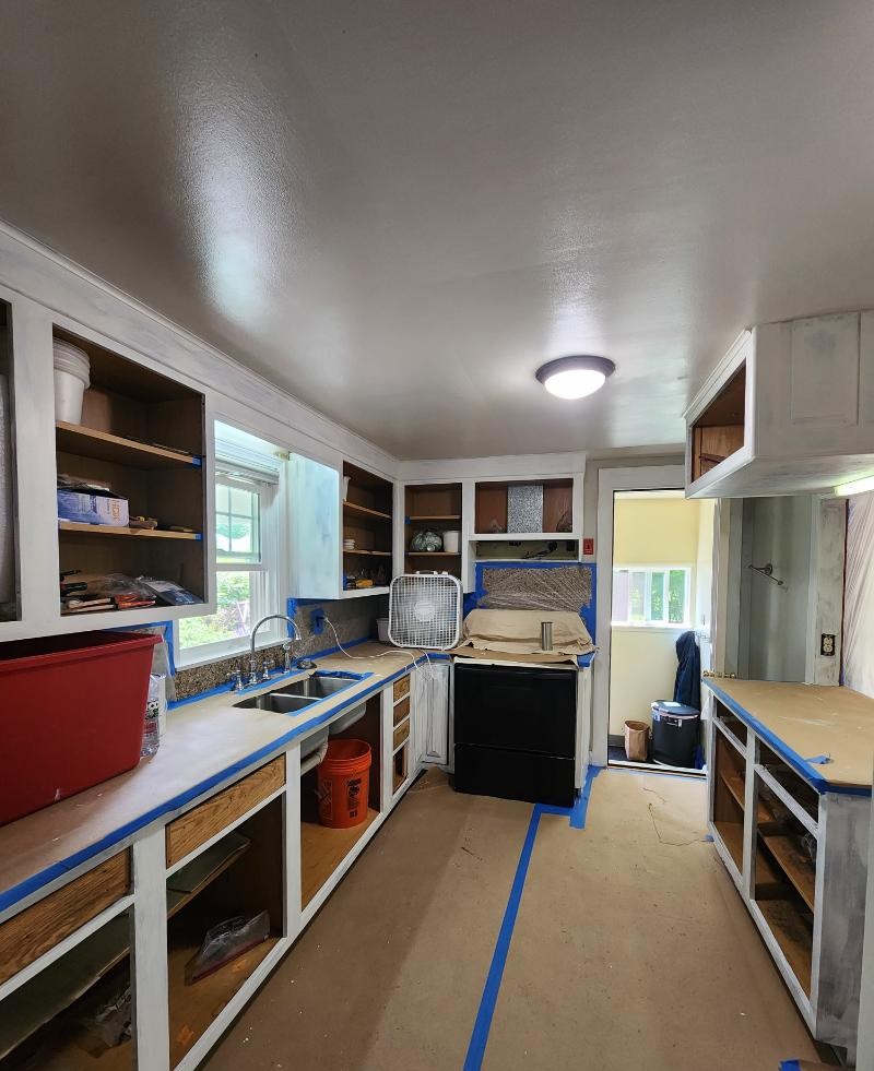 Cabinet painting in progress in Leominster, MA